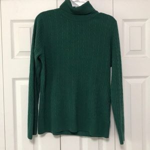 Green turtleneck sweater